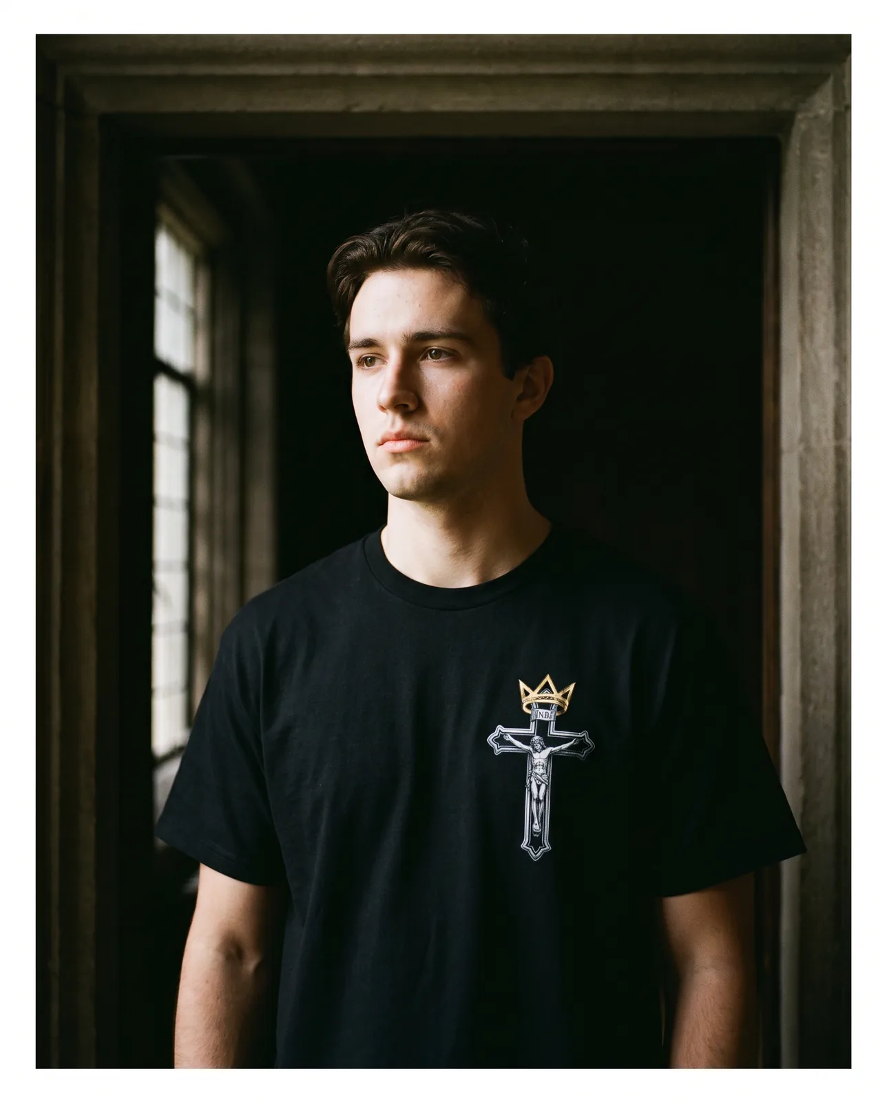 Crowned Choices tee worn, crowned crucifix chest print visible